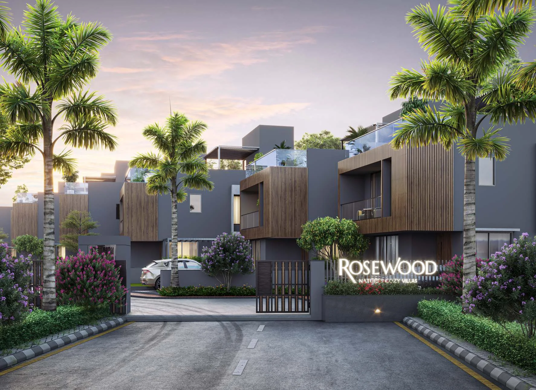 The gated entrance and private villas at dusk